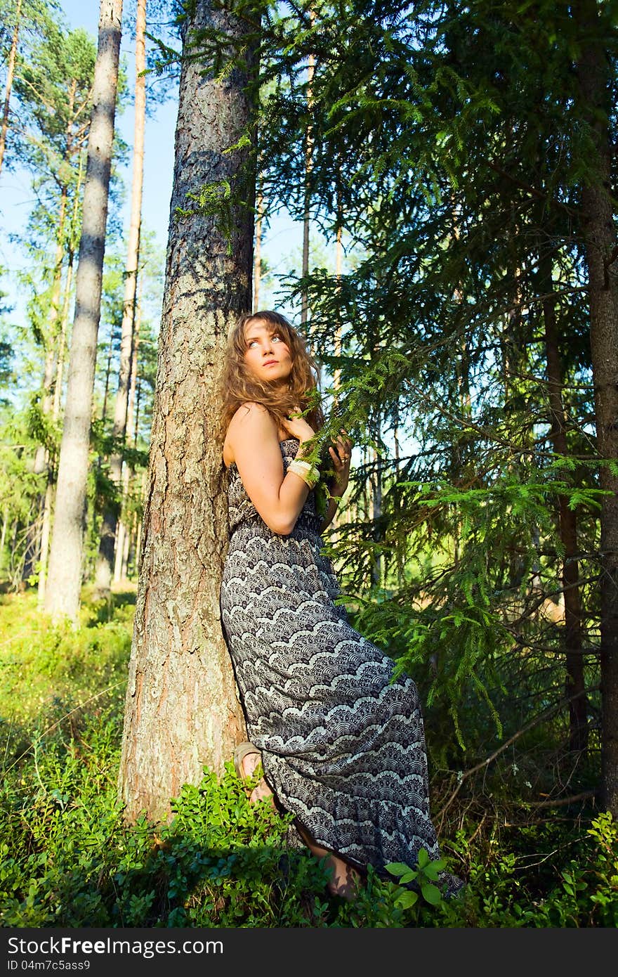 Girl With Long Hair In Forest