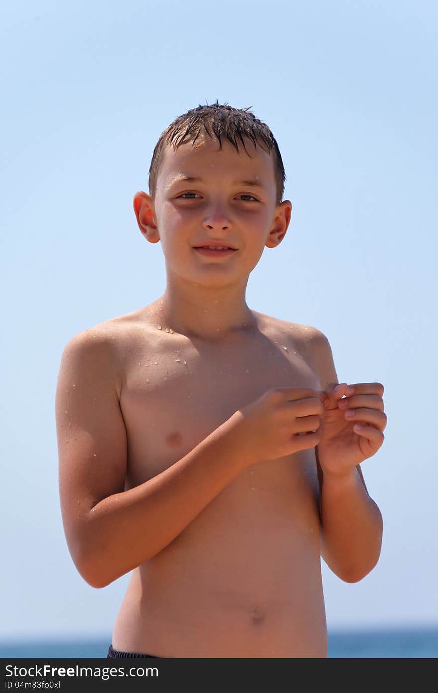 Portrait of a boy during the day in the summer