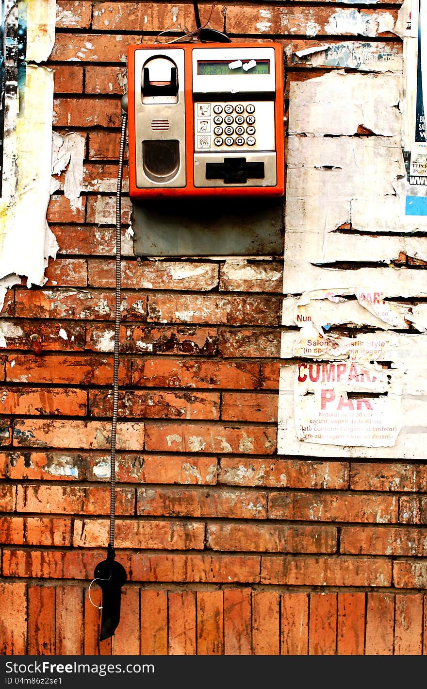 Vandalized pay phone on the streets of Romania