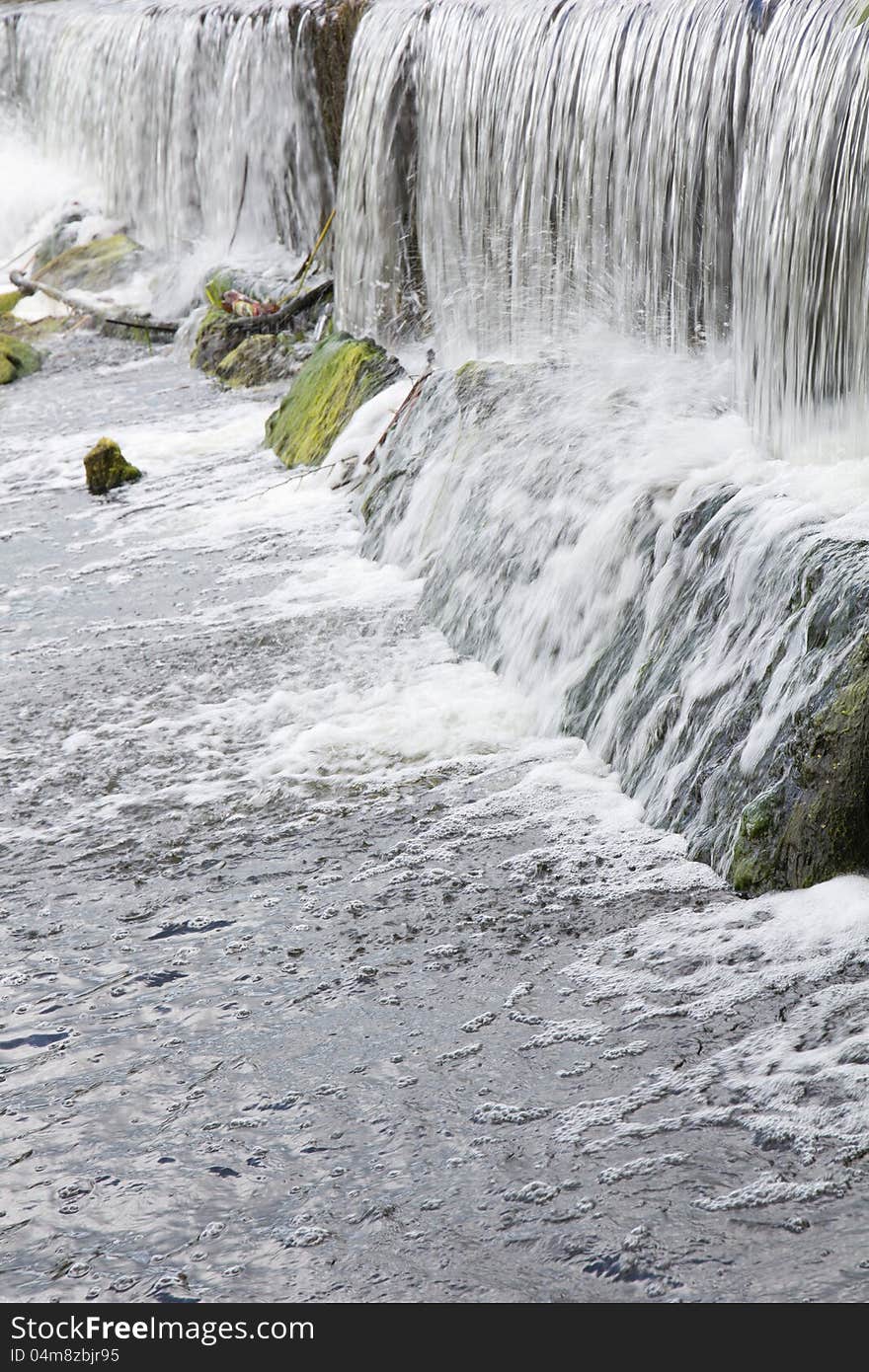 Water flowing over rocks.