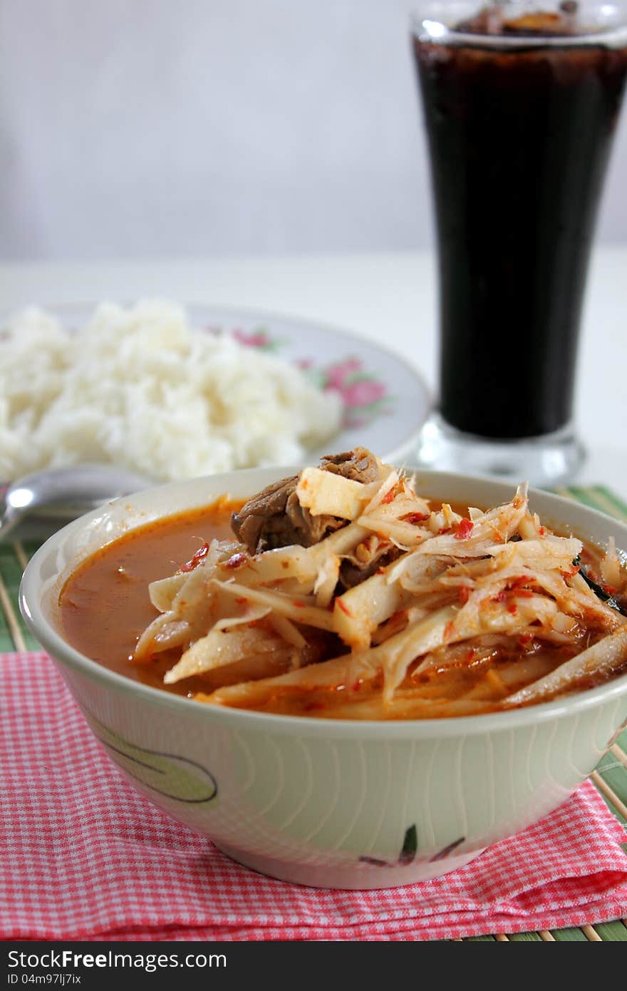 Curry Soft bamboo shoots with spoon fork