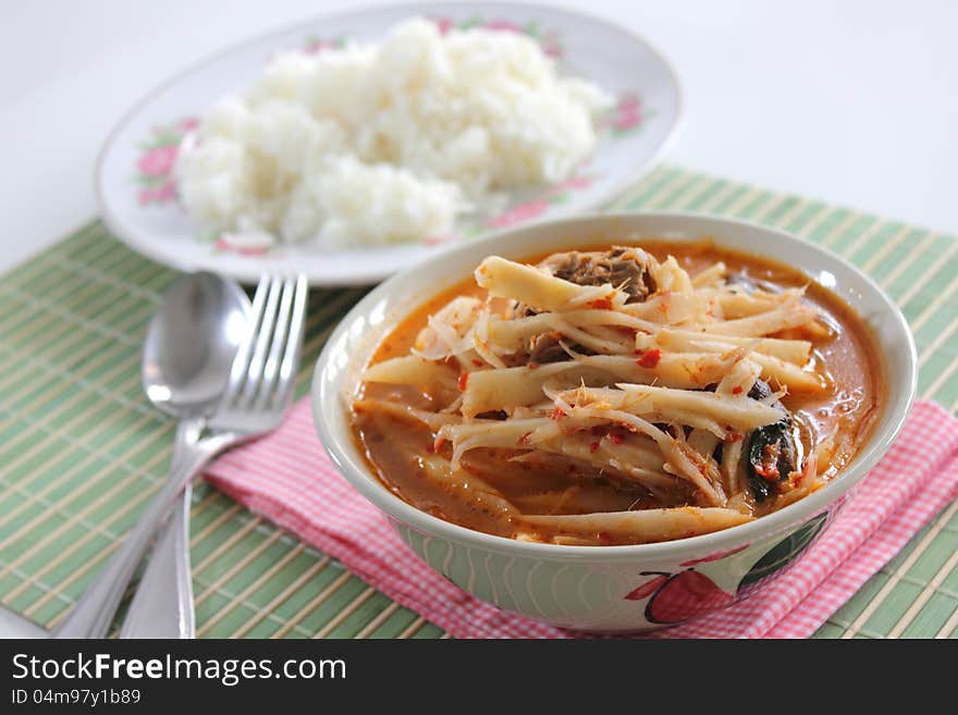 Curry Soft bamboo shoots with spoon fork