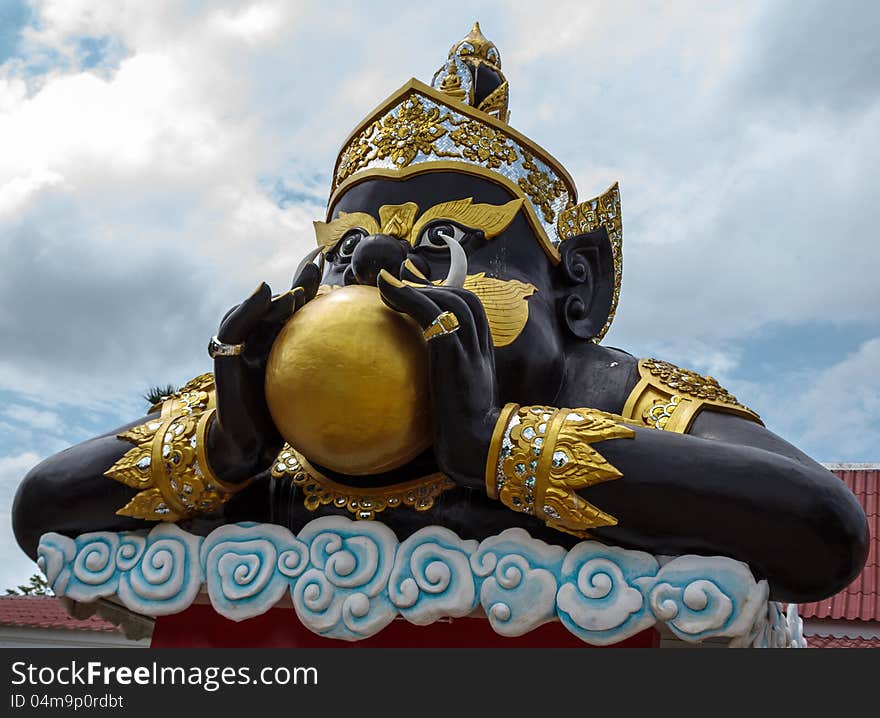 Statue of giant in traditional Thai style molding art, Rahu is god of the Indian. Generality in Thailand, any kind of temple, art decorated in Buddhist church, temple pavillion, temple hall, monk's house etc. created with money donated by people to hire artist. They are public domain or treasure of Buddhism, no restrict in copy or use, noname of artist appear (but, if there is artist name, it only for tell who is the artist of work, not for copyright). This photo is taken under these conditions. Statue of giant in traditional Thai style molding art, Rahu is god of the Indian. Generality in Thailand, any kind of temple, art decorated in Buddhist church, temple pavillion, temple hall, monk's house etc. created with money donated by people to hire artist. They are public domain or treasure of Buddhism, no restrict in copy or use, noname of artist appear (but, if there is artist name, it only for tell who is the artist of work, not for copyright). This photo is taken under these conditions.