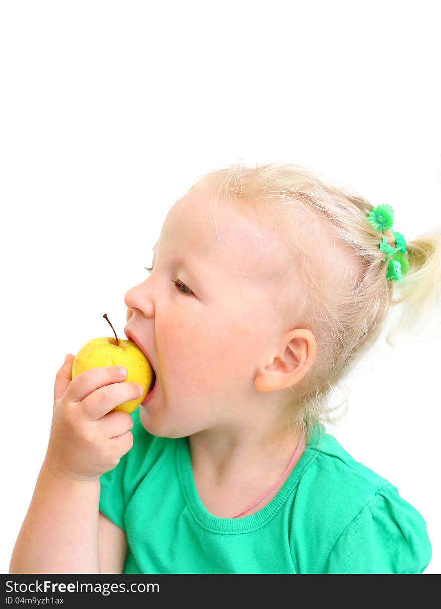 Portrait of a girl biting an apple