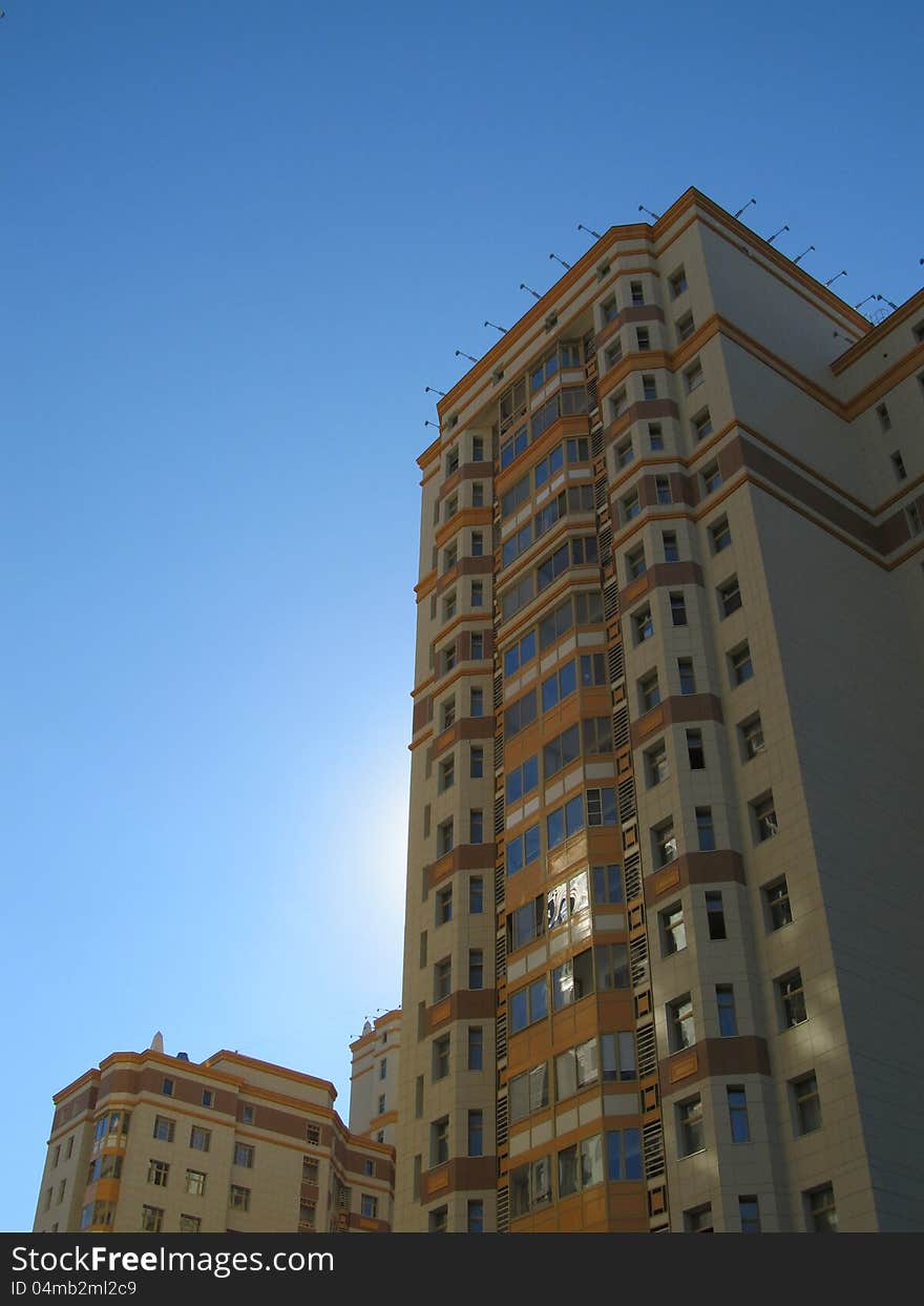 Moscow. High-rise residential building at sunset.