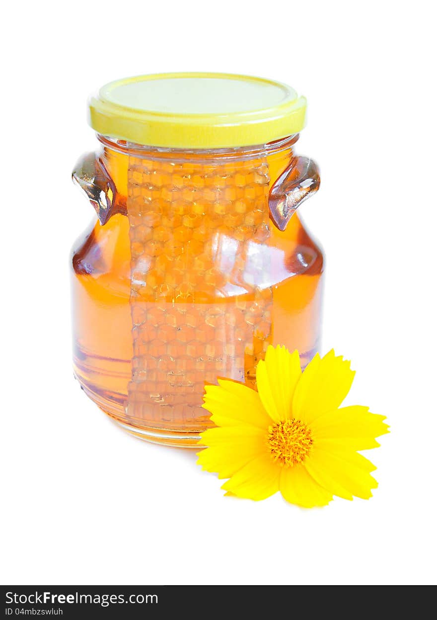 Jar Of Golden Light Honey on a white background