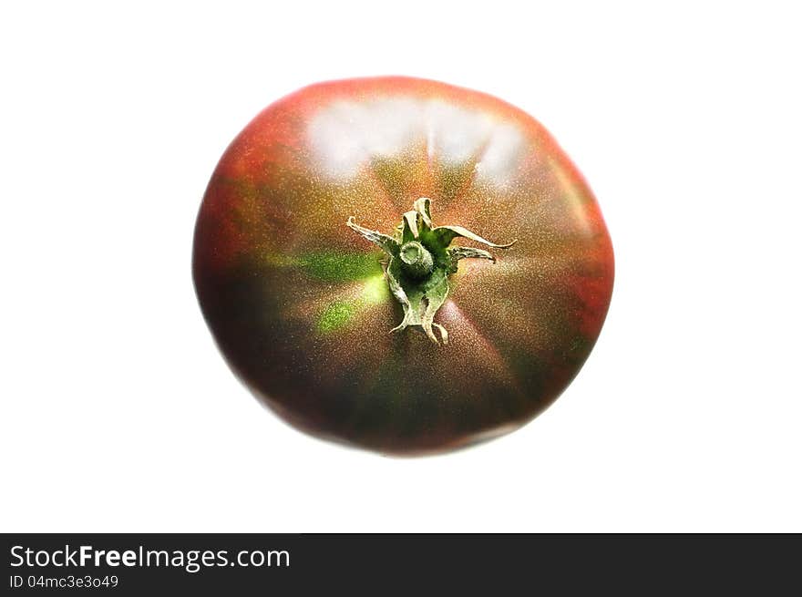 Top view of black krim heirloom tomato isolated on white