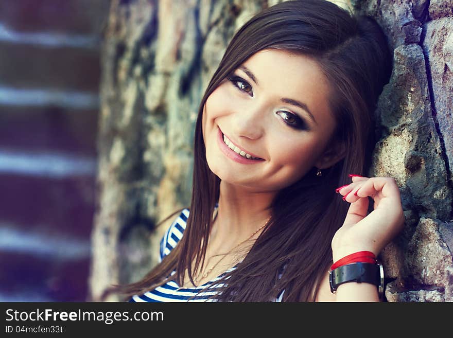 A close up portrait of a brunette beautiful girl. A close up portrait of a brunette beautiful girl