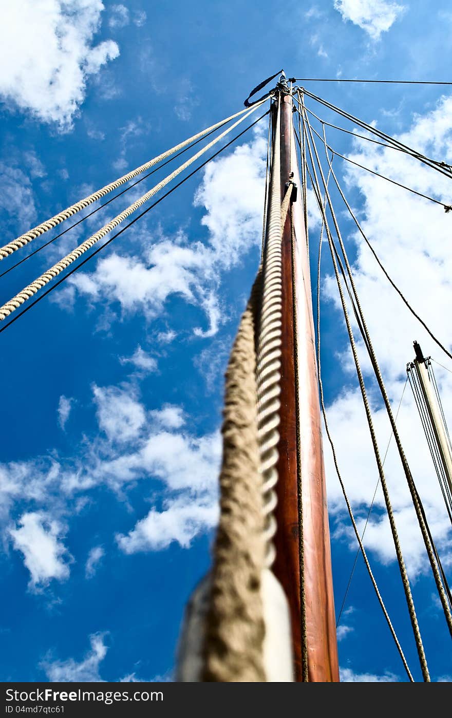 Looking up an old wooden boat mast