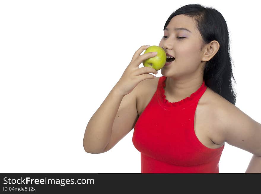 Fat asian woman eat green apple isolated over white background. Fat asian woman eat green apple isolated over white background