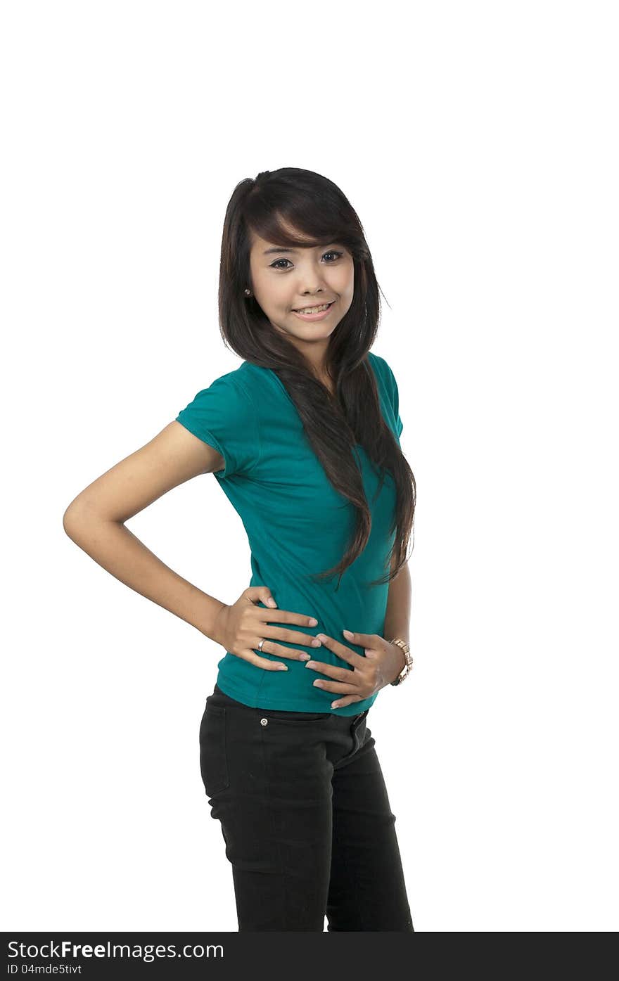 Asian woman in green shirt, posing isolated over white background