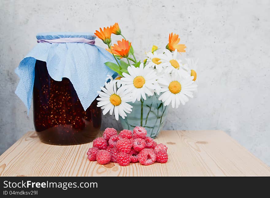 Fresh raspberries and jam