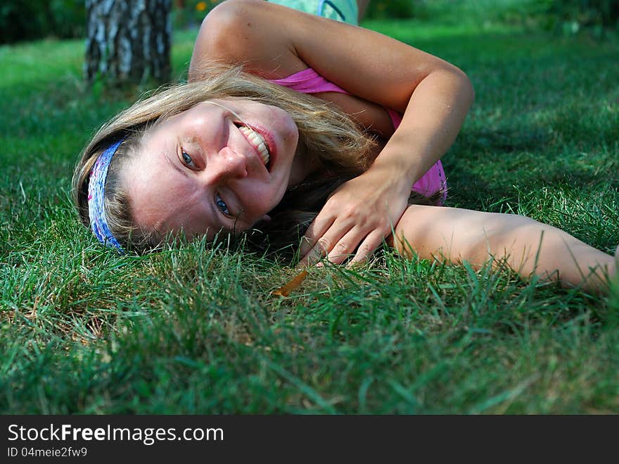 Woman resting on the grass