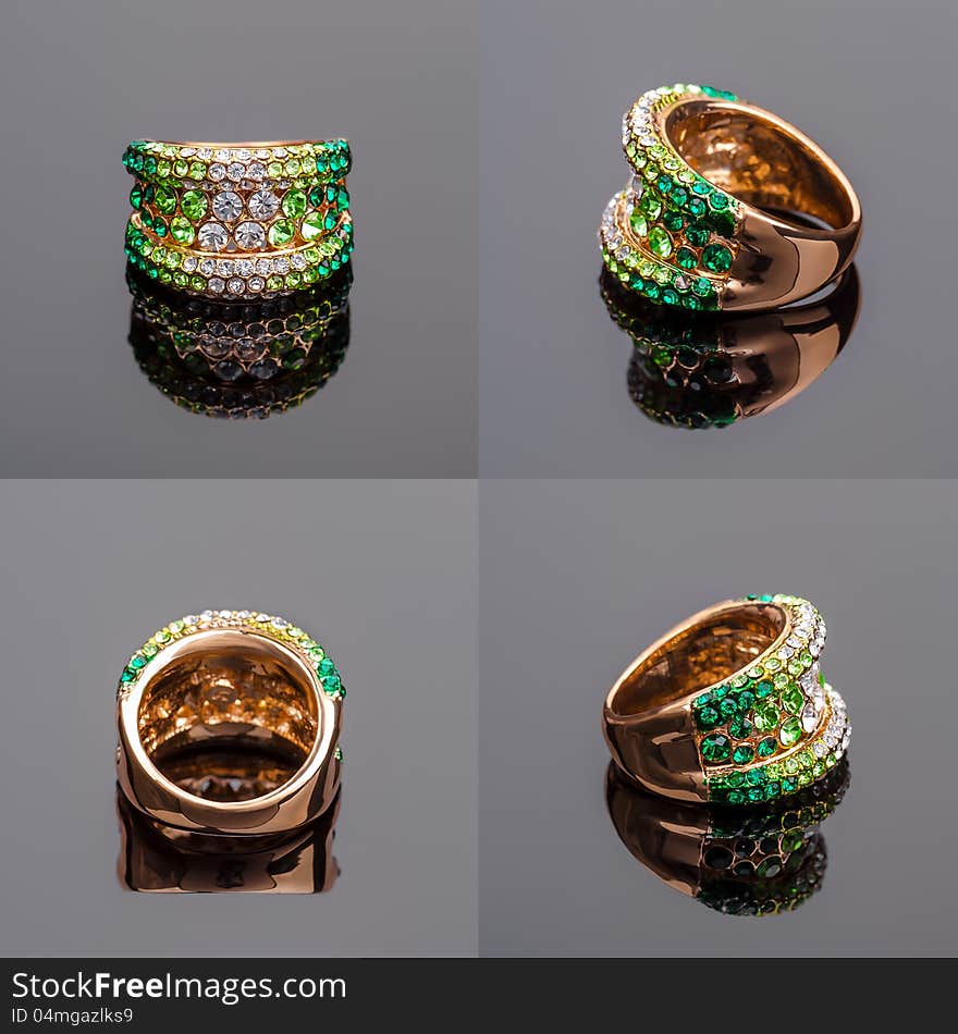 Gold ring with green crystals on all sides. Gold ring with green crystals on all sides