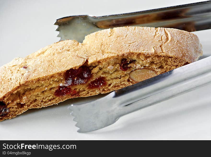 Almond biscotti with berries on the plate