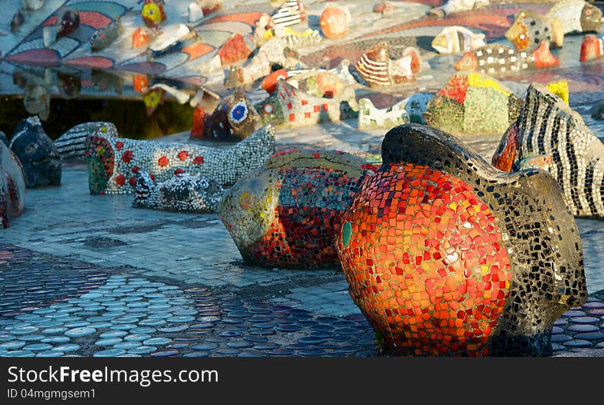 Mosaic Sculpture fountain in the children's park, rich colors and fascinating shapes. Small pieces of the mosaic by fontazii and ability to meet the unique and beautiful designs. Mosaic Sculpture fountain in the children's park, rich colors and fascinating shapes. Small pieces of the mosaic by fontazii and ability to meet the unique and beautiful designs.