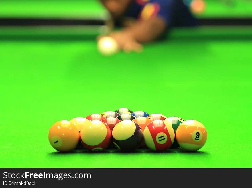 Man Play Billiards