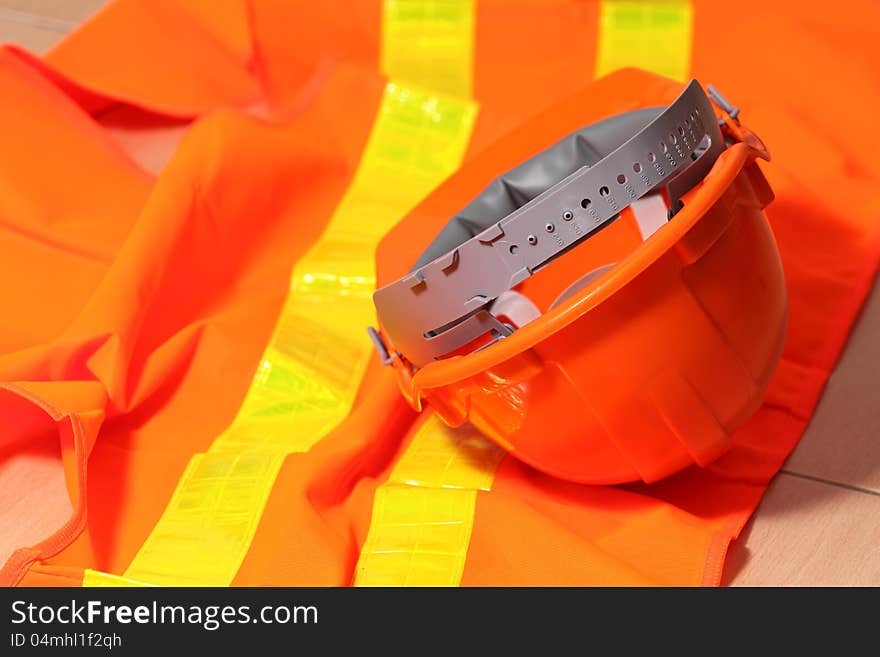 Protection helmet and orange vest