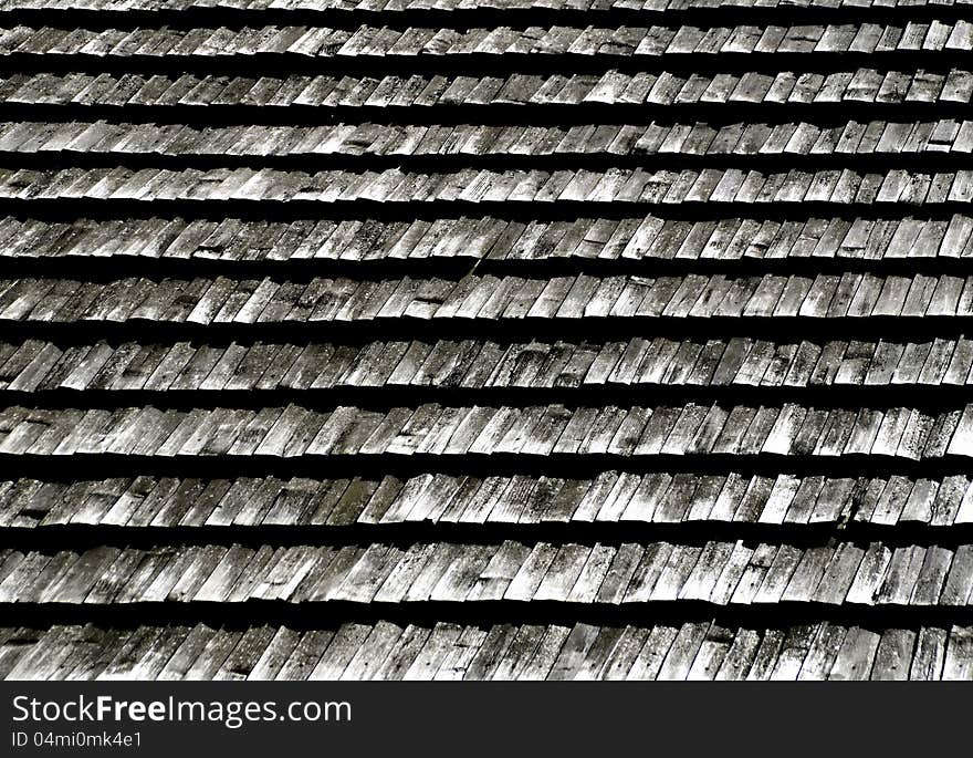 Wallpaper wooden shingles on the roof gray. Wallpaper wooden shingles on the roof gray