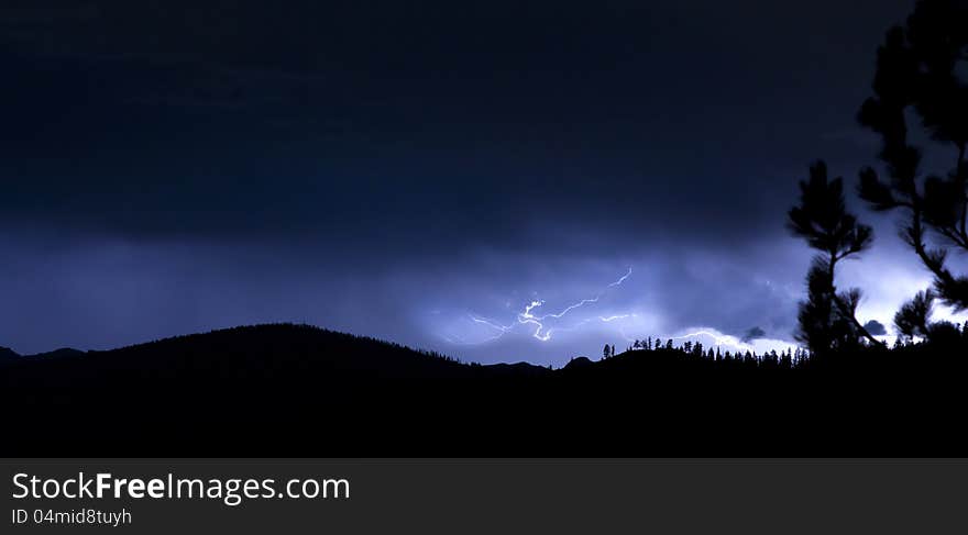 Dark and stormy night on lake Tahoe with bolt of lightning. Dark and stormy night on lake Tahoe with bolt of lightning