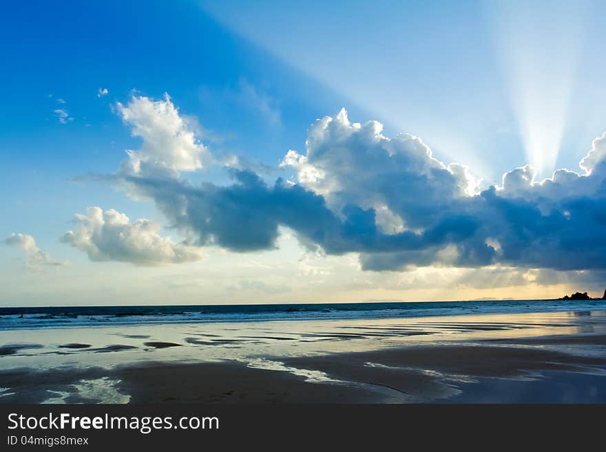 Tropical Beach Sunset Sky With Lighted Clouds