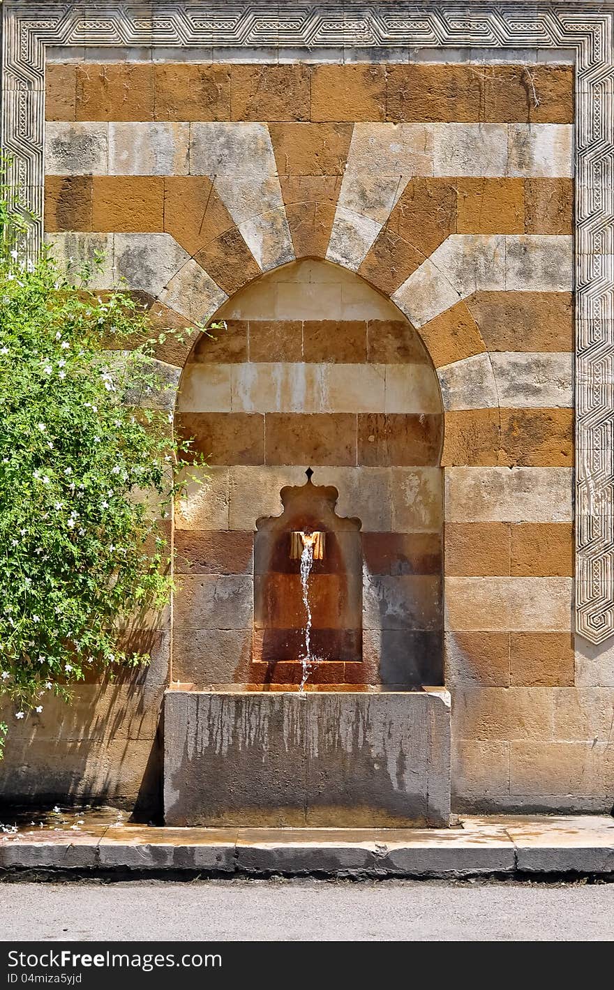 An old water pedestal inspired from Islamic architecture