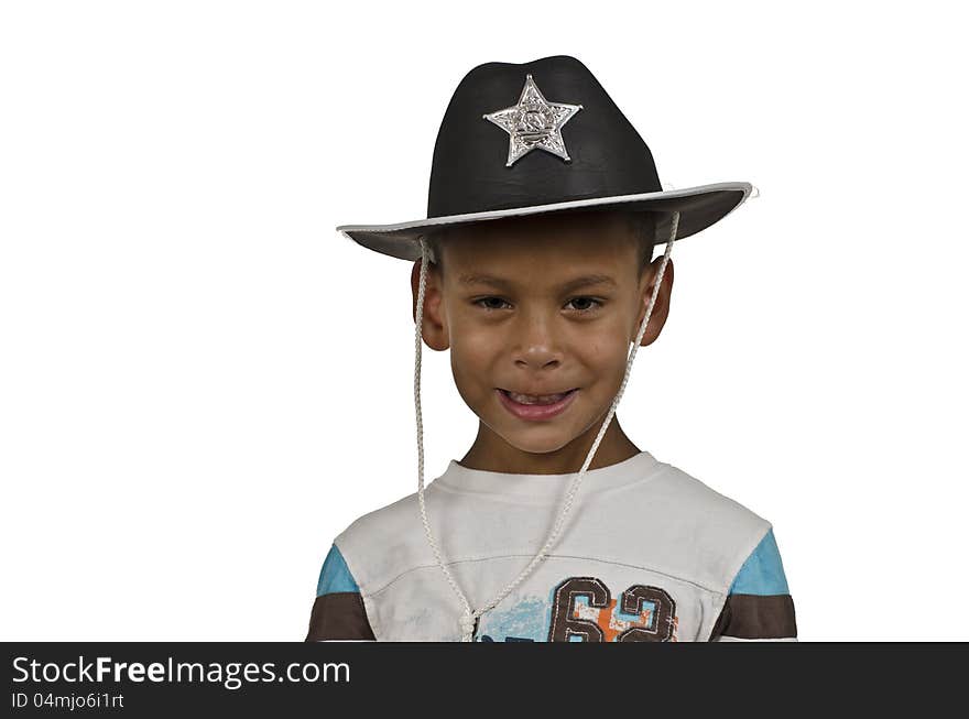 Young African American boy with sheriff hat before white. Young African American boy with sheriff hat before white