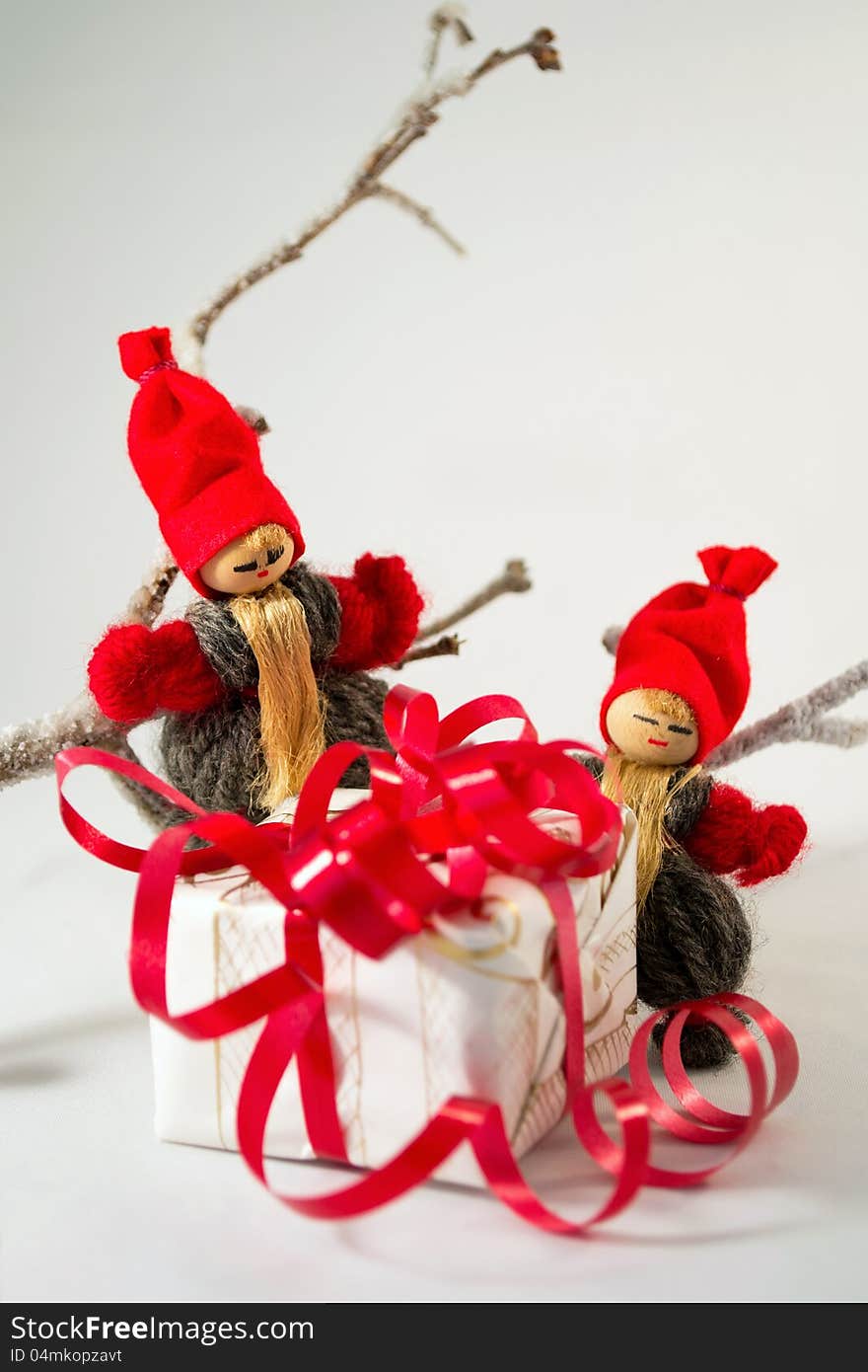 Old-fashioned Santa Clauses with Christmas gift. Old-fashioned Santa Clauses with Christmas gift