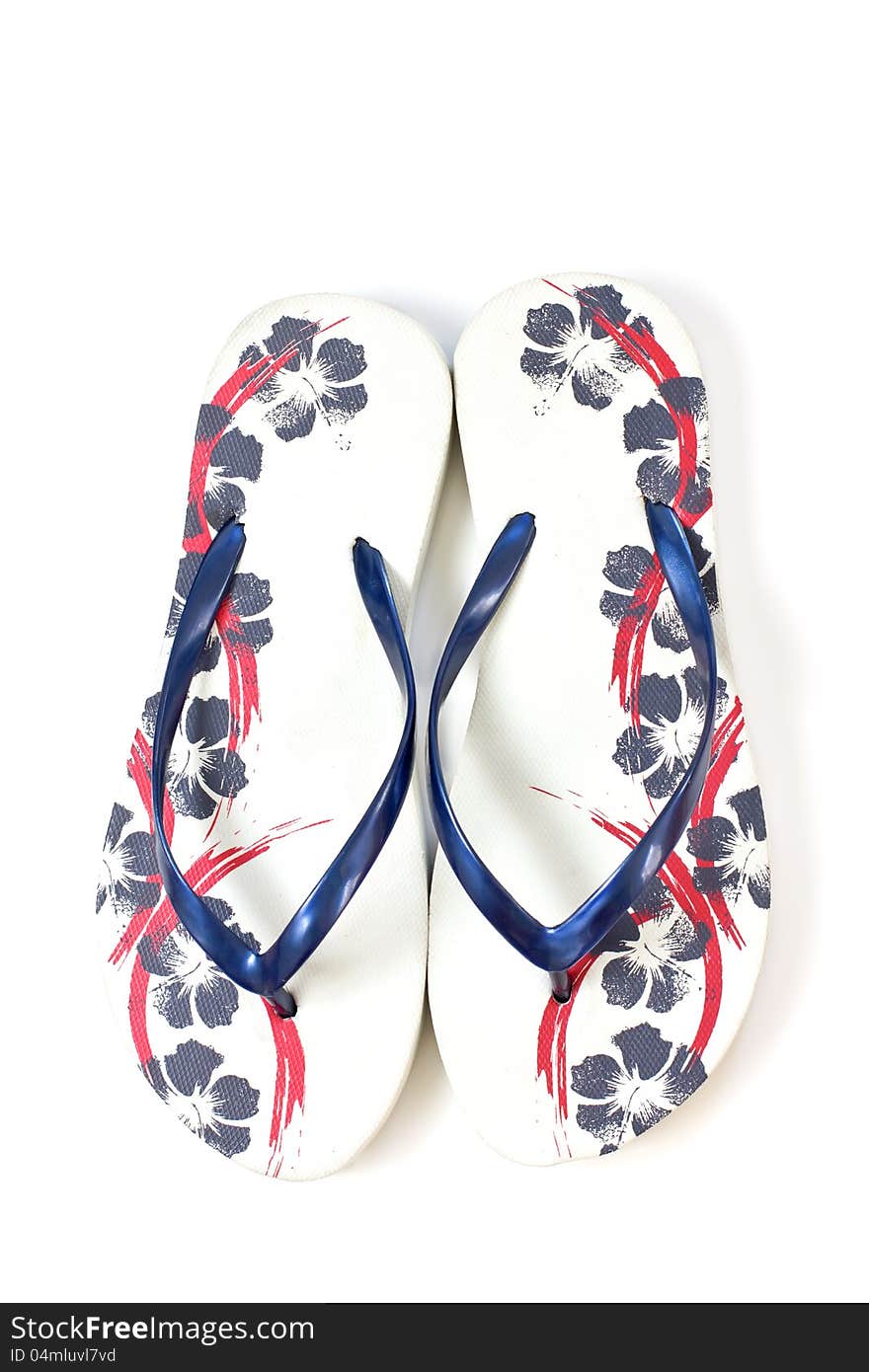 Pair of a colourful slippers on white background. Pair of a colourful slippers on white background