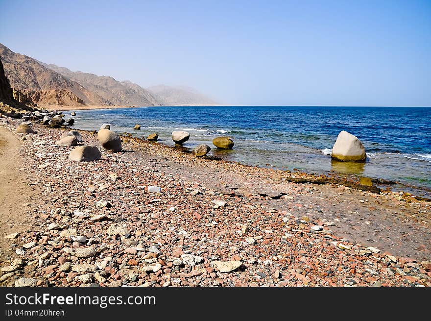 Spread out stones on the rocky coast