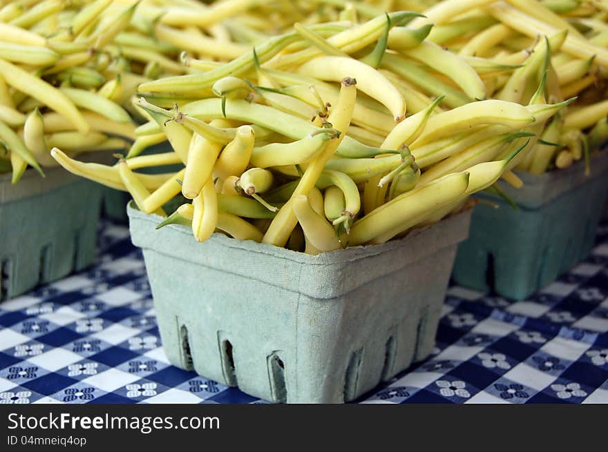 A bunch of farmers beans in baskets. A bunch of farmers beans in baskets.