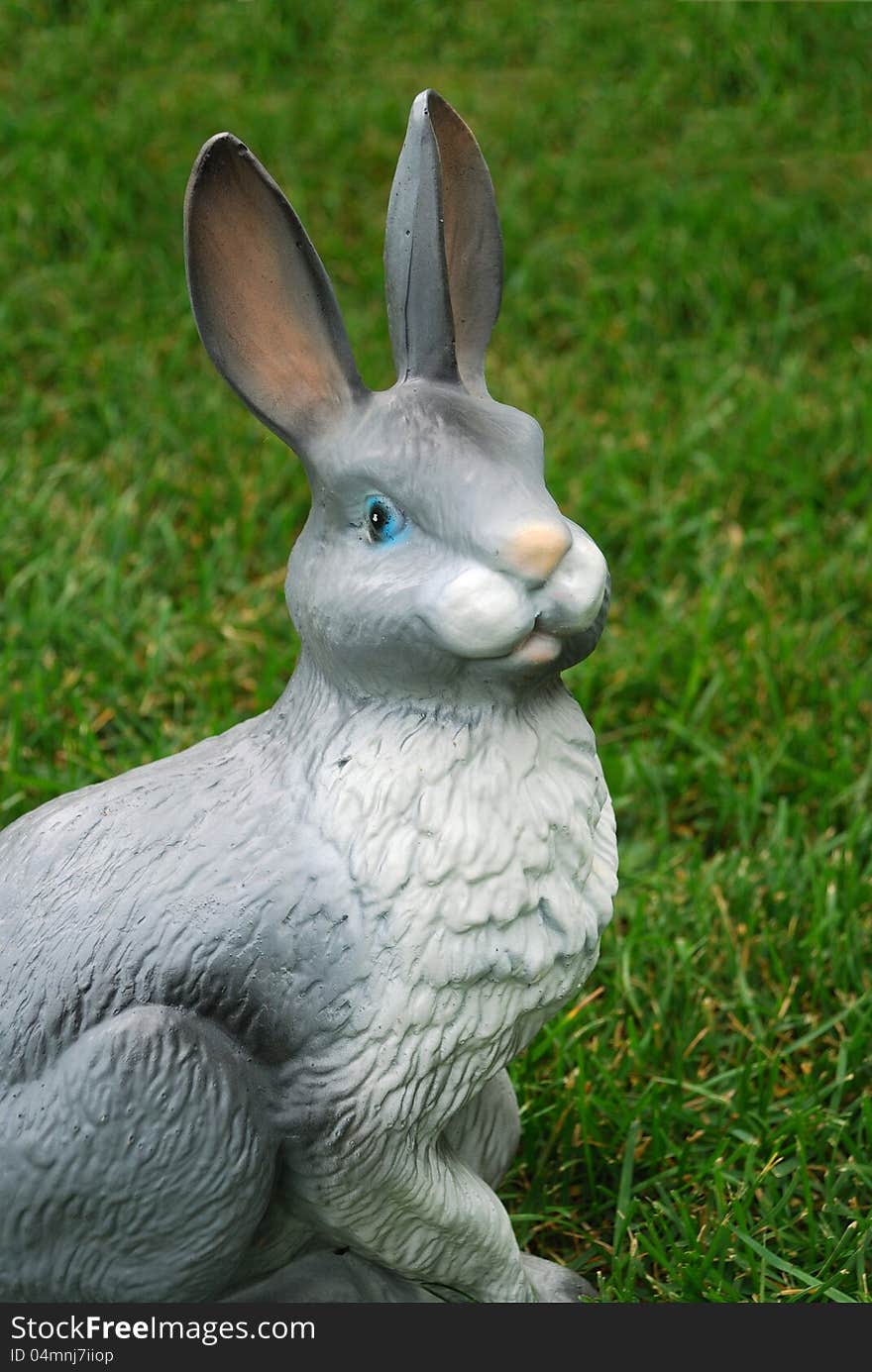 Plastic bunny on the grass