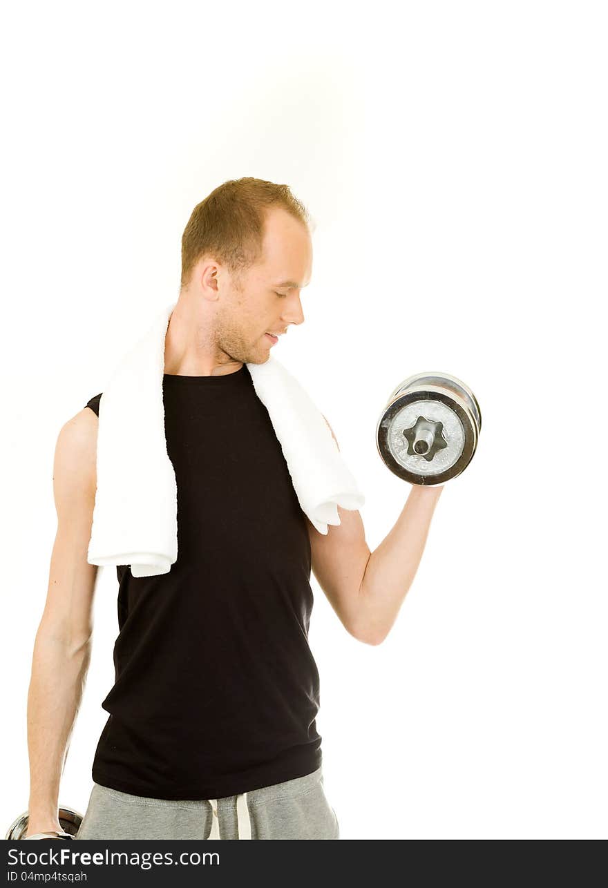 Man in sportswear ready to lift the dumbbells and for exercise. Man in sportswear ready to lift the dumbbells and for exercise.