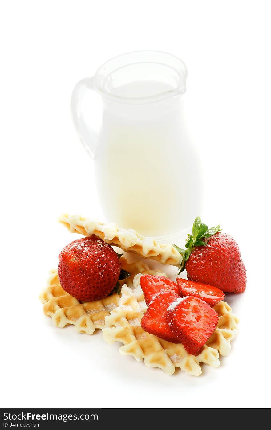 Delicious Waffles, Perfect Strawberries with Sugar Powder and Milk Jug on white background. Delicious Waffles, Perfect Strawberries with Sugar Powder and Milk Jug on white background