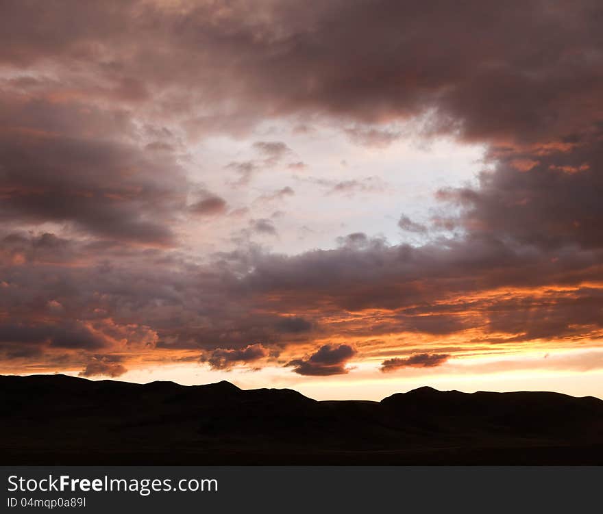 Silhouette of mountains against the beautiful sunset sky. Silhouette of mountains against the beautiful sunset sky