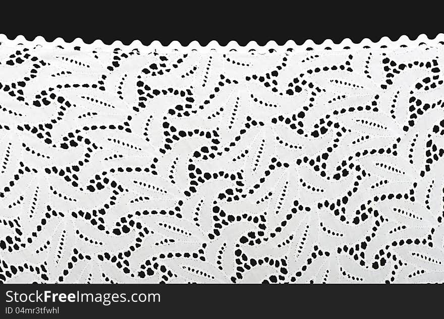 White lace on a black background