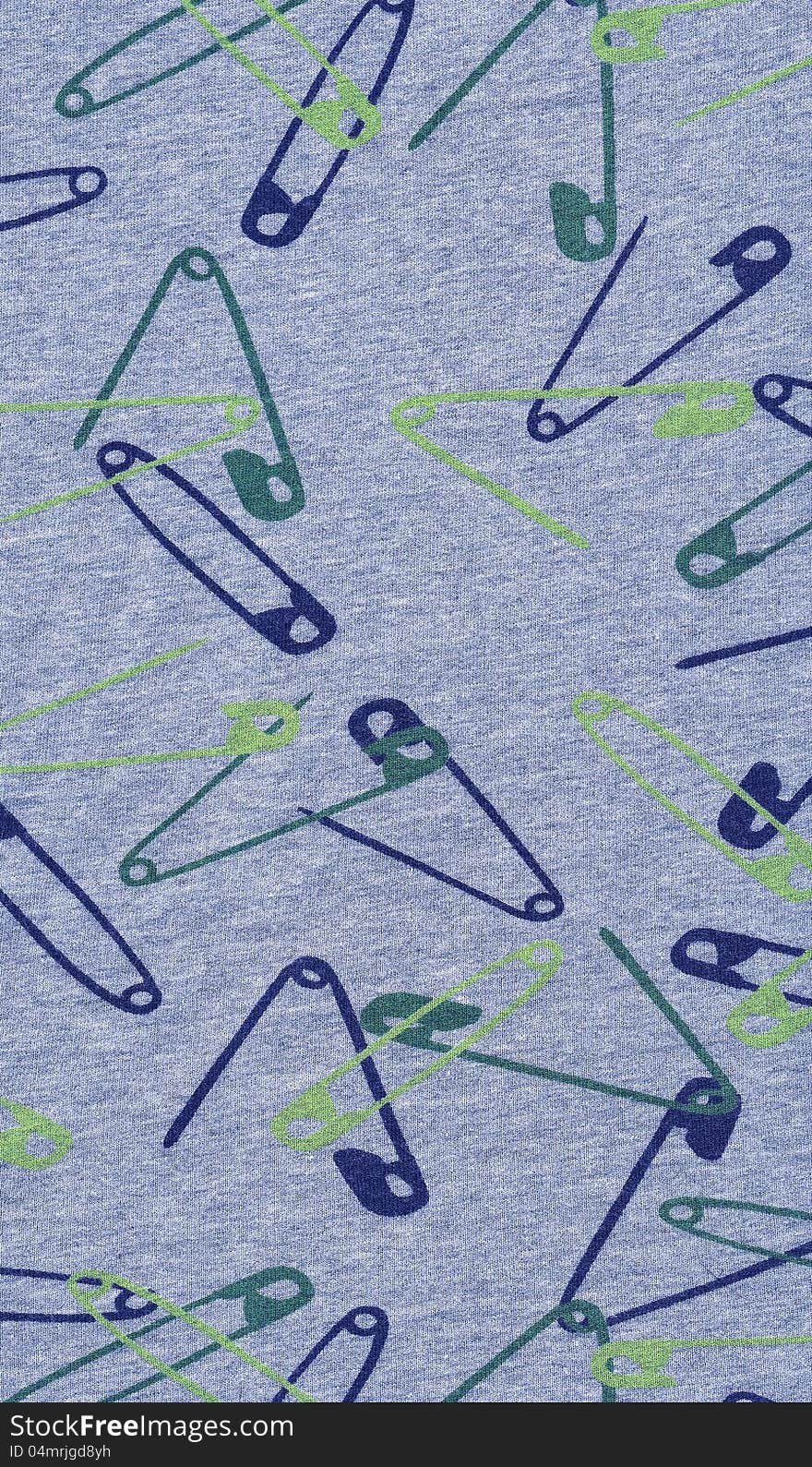 Blue safety pins background.