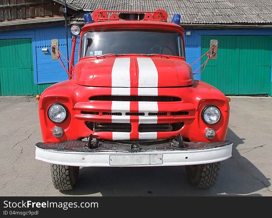 Red with white stripes fire truck