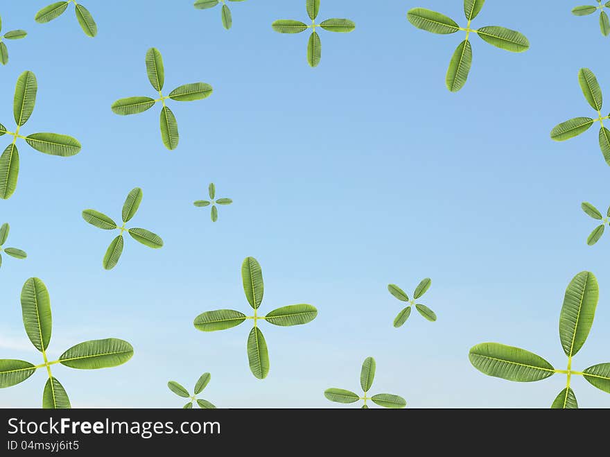 Leaf in plus sign various size random twist in clear blue sky represent to add more green to the earth for better environment. Leaf in plus sign various size random twist in clear blue sky represent to add more green to the earth for better environment