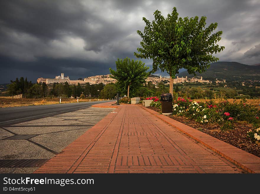 Road to Assisi durint the summer storm