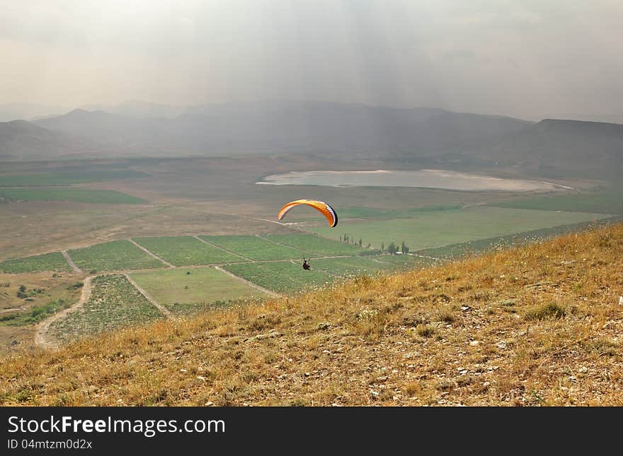 Glider flying in the mountains