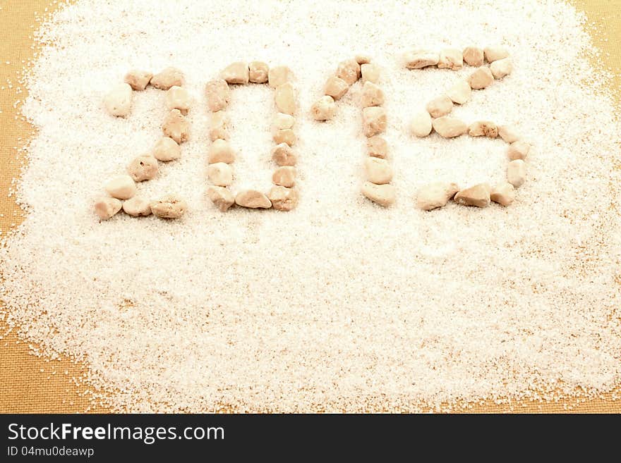 New year 2013 written with pebbles. New year 2013 written with pebbles.