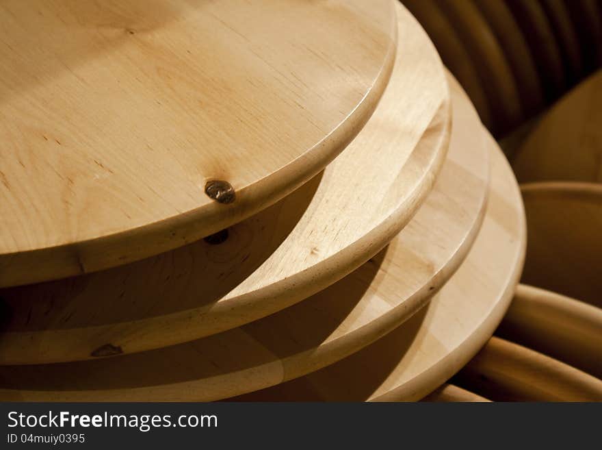 Round wood cutting boards stacked upon each other. Round wood cutting boards stacked upon each other