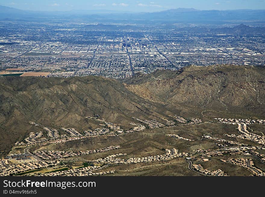 Phoenix, Arizona from behind South Mountain. Phoenix, Arizona from behind South Mountain