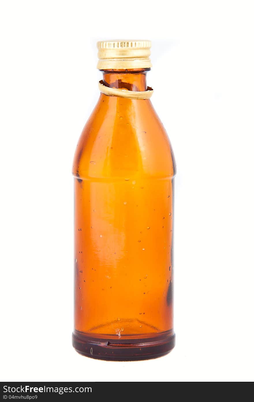 Orange empty Glass bottle on white background. Orange empty Glass bottle on white background