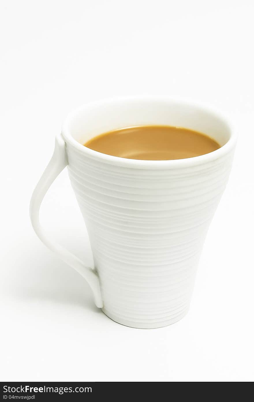 Tea in a cup being photographed in the studio.