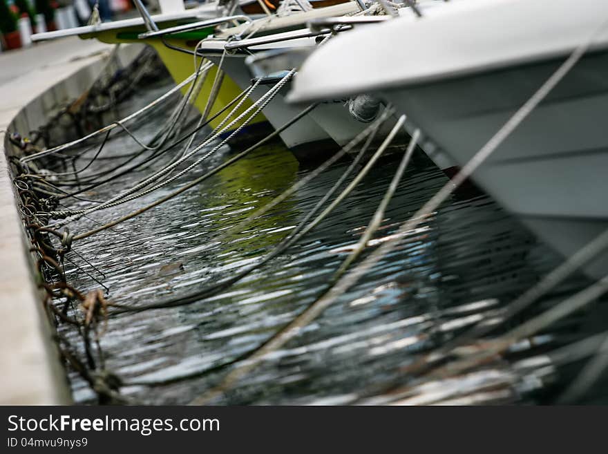 Boats hitched to a sement wall in Croatia