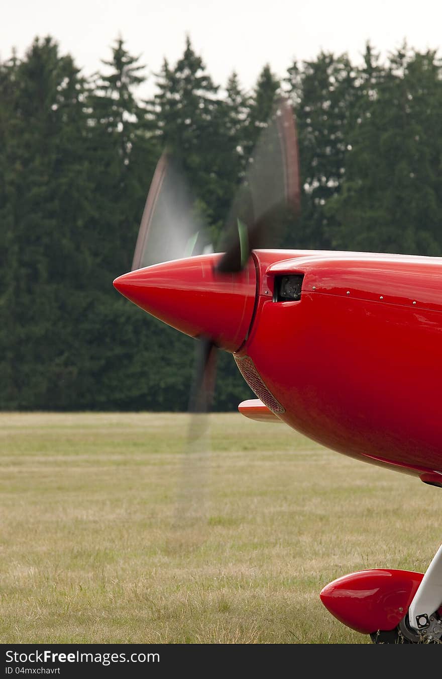 A part of a sports airplane. A part of a sports airplane