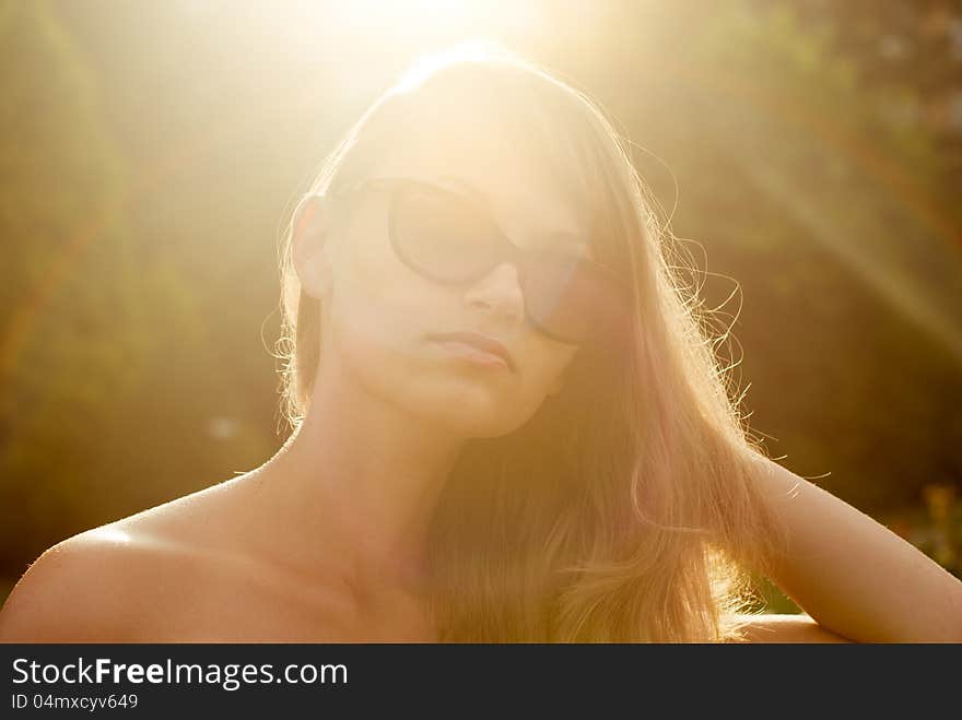 Portrait of young model in contr sunlight outdoor. Portrait of young model in contr sunlight outdoor