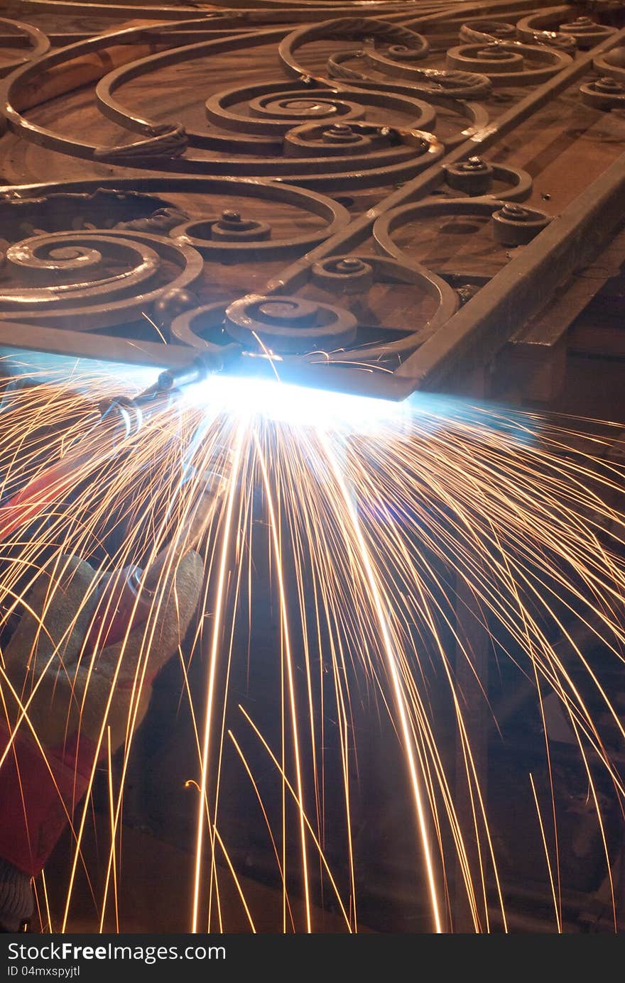 Worker Welding Metal. Production And Construction